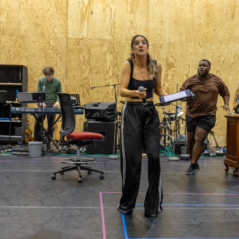 Dylan Townley, Rebecca Levy and Tomi Ogbaro in rehearsals.